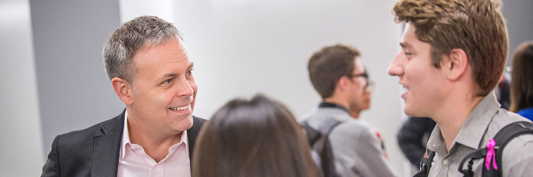 Anthony Carothers talks with a student.